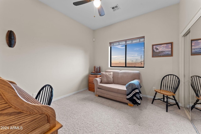 office area with ceiling fan and carpet flooring