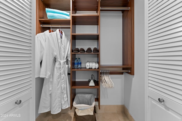 spacious closet featuring tile patterned floors