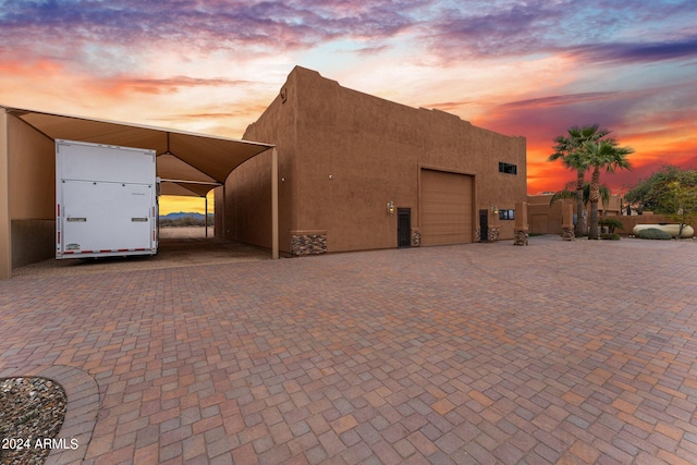 exterior space featuring a carport