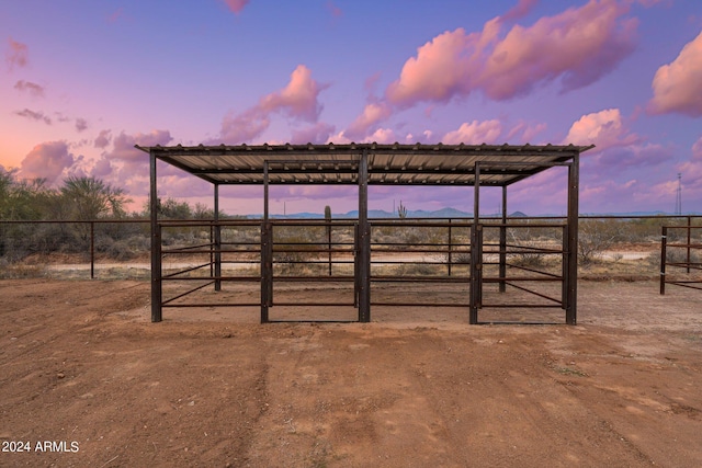 view of outdoor structure at dusk