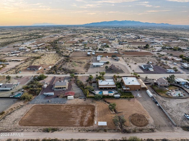 aerial view at dusk with a mountain view