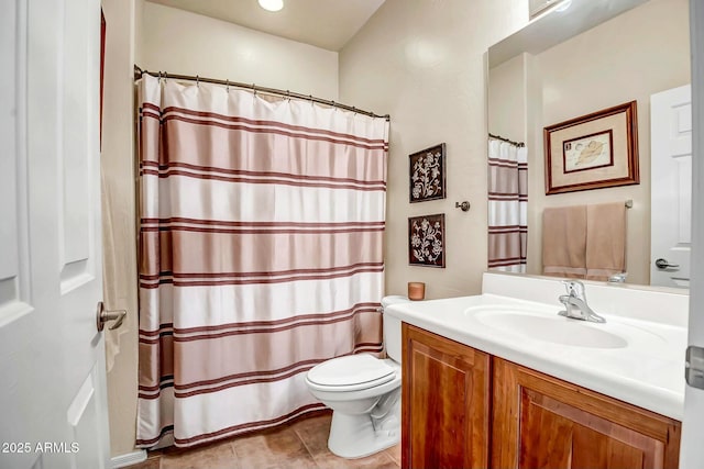 full bathroom with tile patterned floors, curtained shower, toilet, and vanity