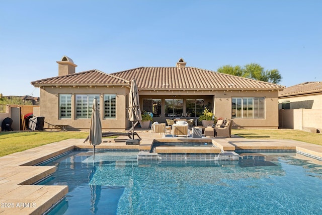3917 E Patrick Ln, Phoenix, AZ 85050 - rear view of property with a tiled roof, stucco siding, and a patio
