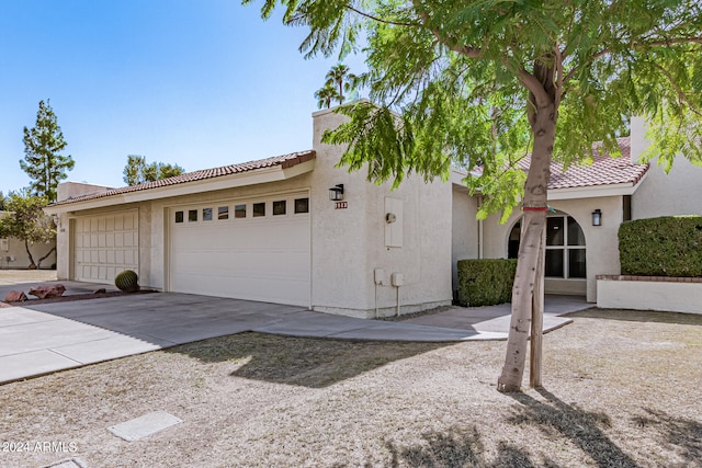 view of front of property featuring a garage