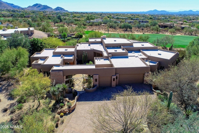 drone / aerial view featuring a mountain view