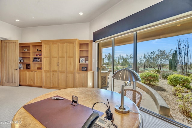 view of carpeted dining space