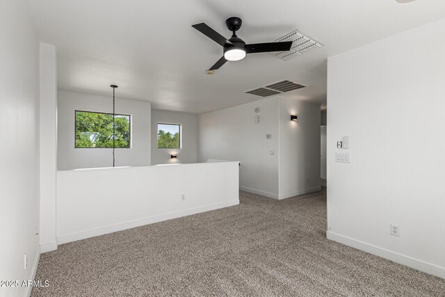 2112 S 160th Dr, Goodyear, AZ 85338 - unfurnished room featuring a ceiling fan and carpet