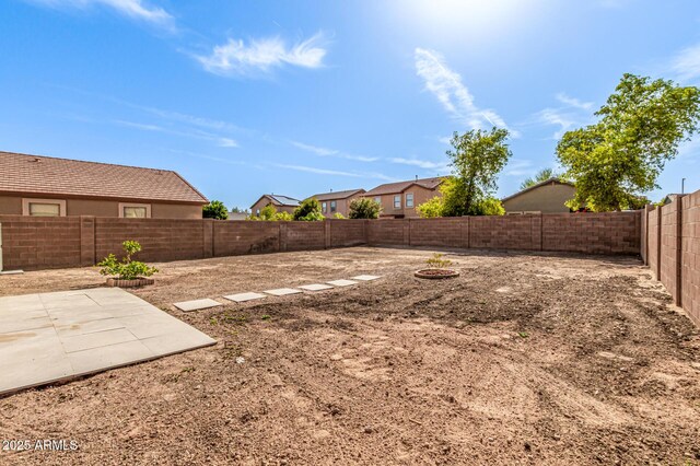 2112 S 160th Dr, Goodyear, AZ 85338 - fenced backyard with a patio area
