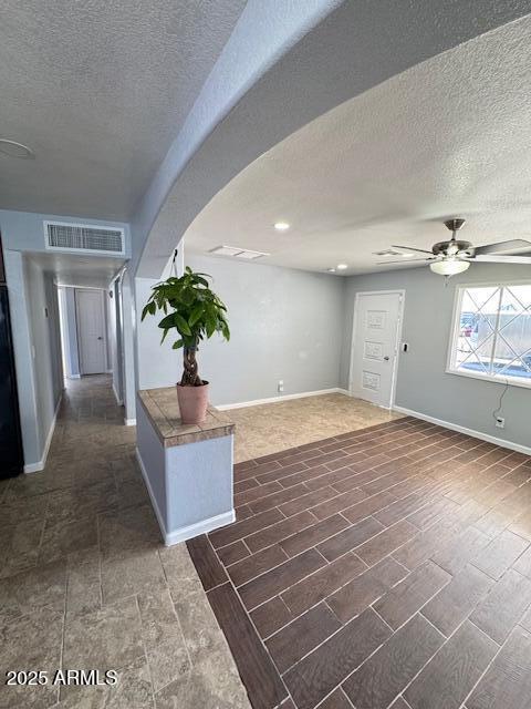 interior space with a textured ceiling