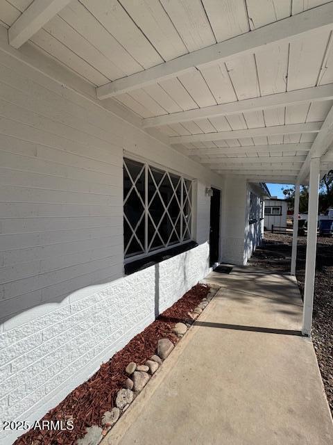 exterior space featuring a carport