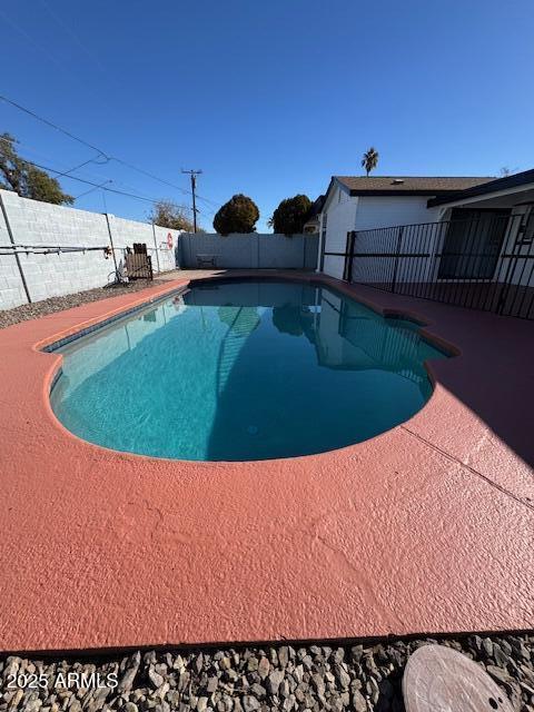 view of pool with a patio