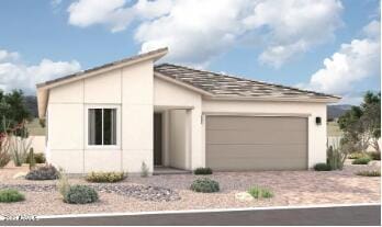15866 W Miami St, Goodyear, AZ 85338 - view of front of house with an attached garage, stucco siding, and driveway