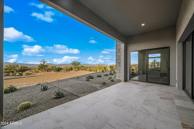 view of patio with a mountain view