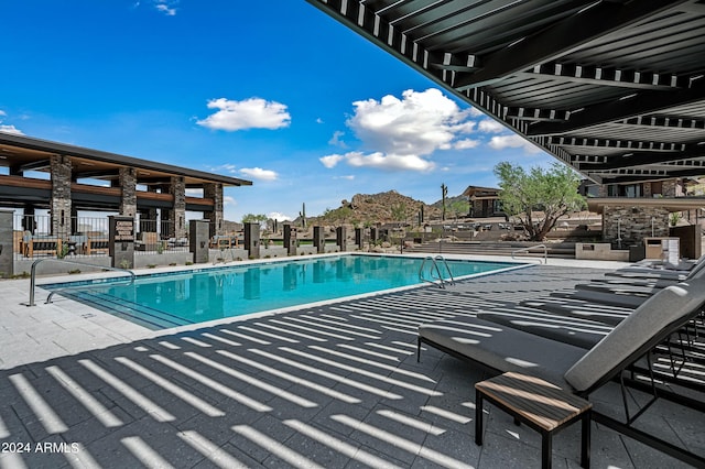 view of pool with a patio area