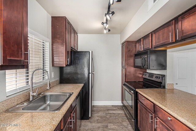 kitchen featuring rail lighting, sink, fridge, electric range, and dark hardwood / wood-style flooring