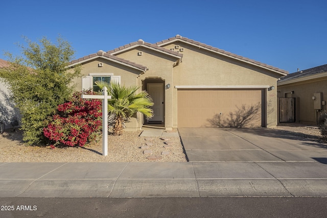 view of front of property with a garage