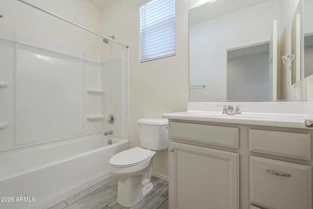 full bathroom featuring vanity, toilet, and tub / shower combination