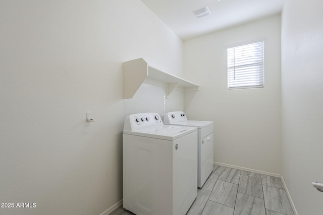 laundry area featuring washer and clothes dryer