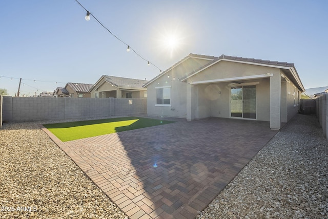 rear view of property with a patio area