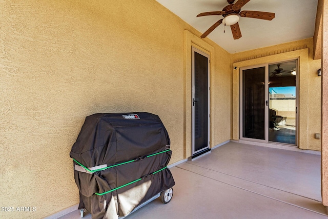 view of patio with ceiling fan