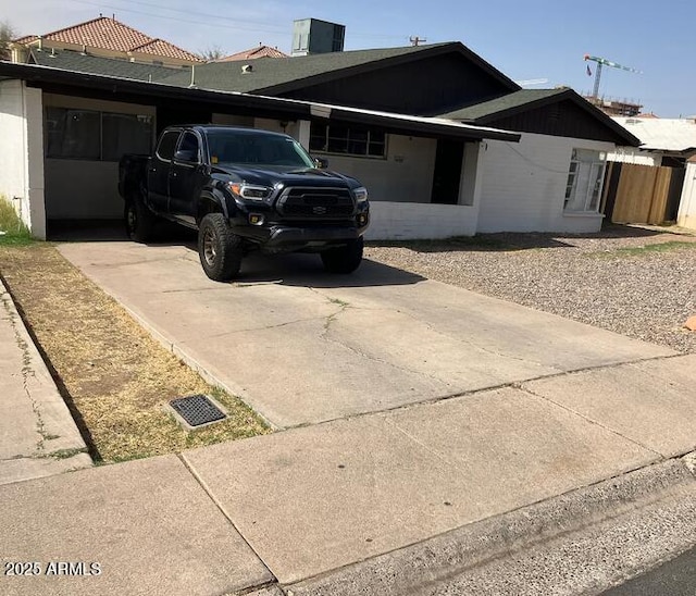 1432 S Stanley Pl, Tempe, AZ 85281 - view of front of house with central air condition unit and driveway