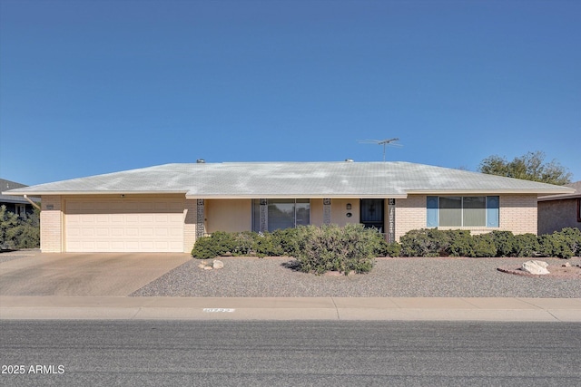 single story home with a garage