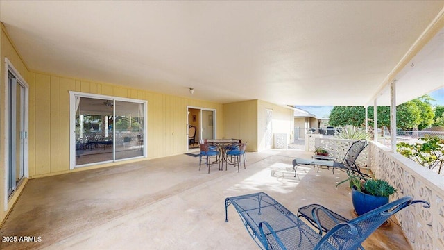 10506 W Desert Forest Cir, Sun City, AZ 85351 - view of patio featuring fence and outdoor dining area