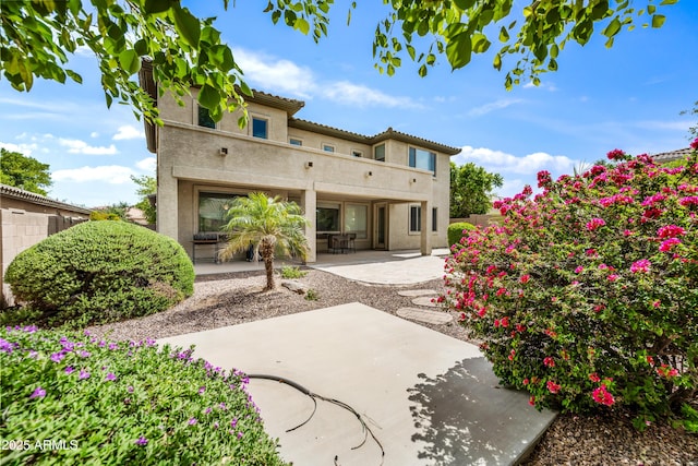 19242 W Pasadena Ave, Litchfield Park, AZ 85340 - back of house with stucco siding, a patio, and a tile roof