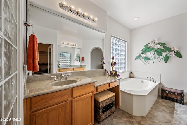 19242 W Pasadena Ave, Litchfield Park, AZ 85340 - bathroom with vanity and a bath