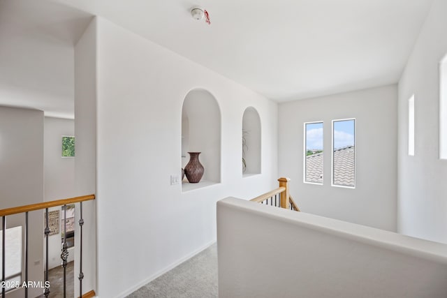 19242 W Pasadena Ave, Litchfield Park, AZ 85340 - hall with an upstairs landing, carpet flooring, and baseboards