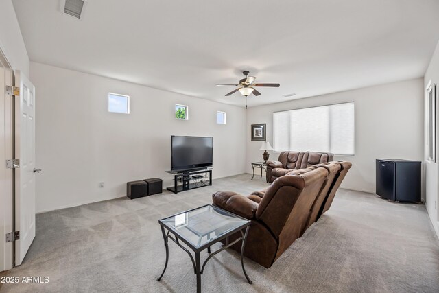 19242 W Pasadena Ave, Litchfield Park, AZ 85340 - living area with light carpet and a ceiling fan