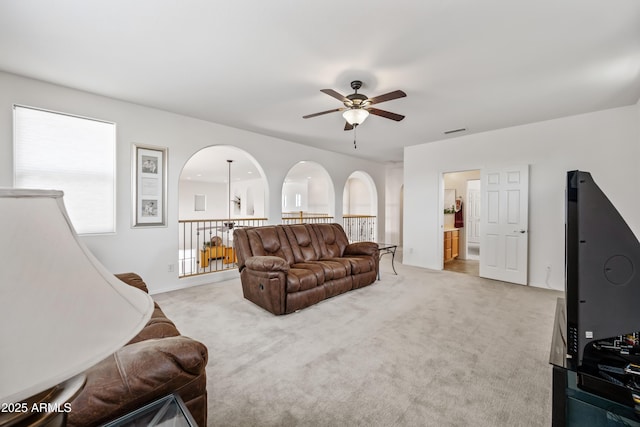 19242 W Pasadena Ave, Litchfield Park, AZ 85340 - living area featuring a ceiling fan and light colored carpet