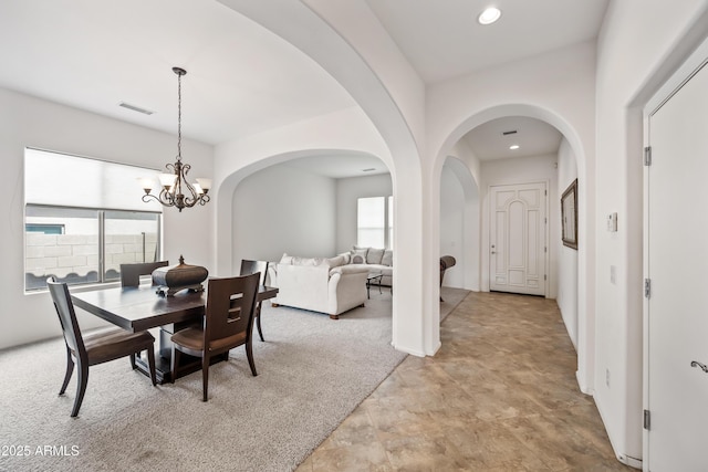 19242 W Pasadena Ave, Litchfield Park, AZ 85340 - dining area with arched walkways, a chandelier, and recessed lighting