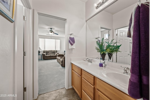 19242 W Pasadena Ave, Litchfield Park, AZ 85340 - full bath with double vanity, a ceiling fan, and tile patterned flooring