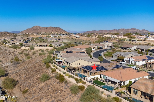 bird's eye view with a mountain view