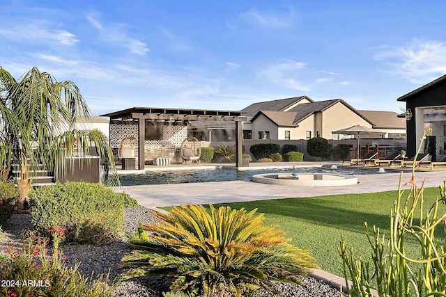 surrounding community featuring a patio, a lawn, and a pool with hot tub