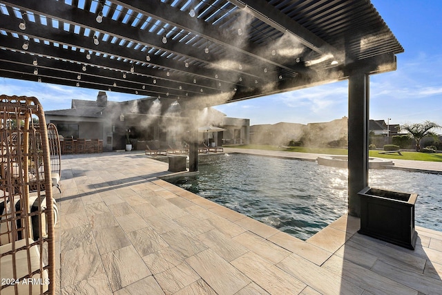 view of patio / terrace featuring a pergola and a mountain view