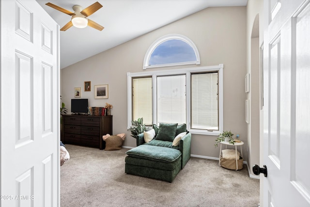 sitting room featuring carpet floors, a ceiling fan, high vaulted ceiling, and baseboards