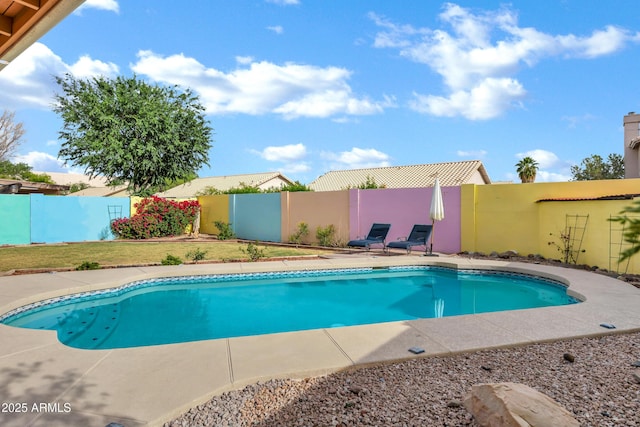 view of swimming pool with a fenced in pool and a fenced backyard
