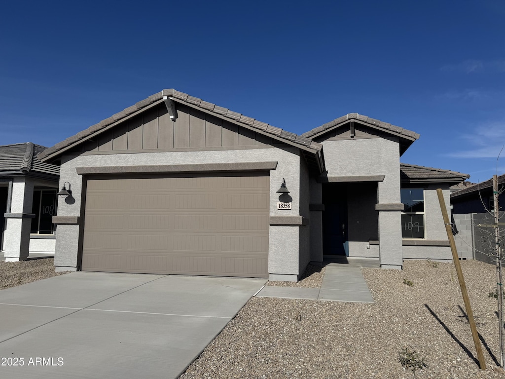 view of front of property with a garage