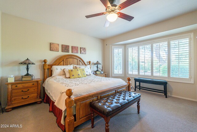 bedroom featuring ceiling fan and carpet flooring