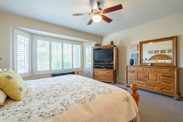 carpeted bedroom featuring ceiling fan