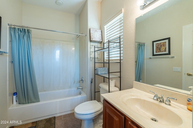 full bathroom with vanity, tile patterned floors, toilet, and shower / tub combo with curtain