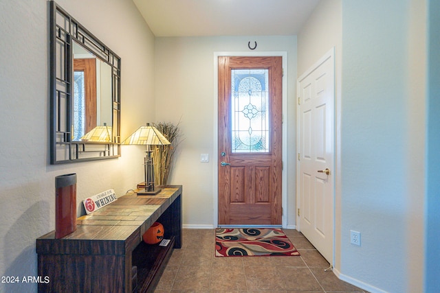 view of tiled foyer entrance