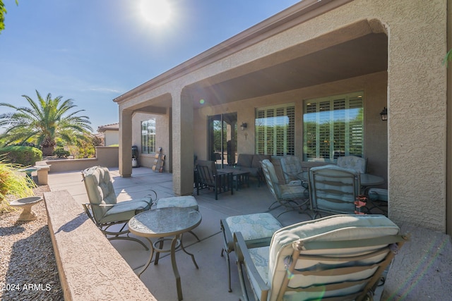 view of patio with an outdoor living space