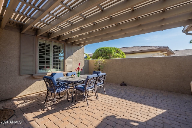 view of patio featuring a pergola