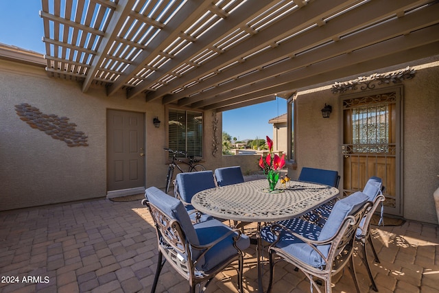 view of patio featuring a pergola