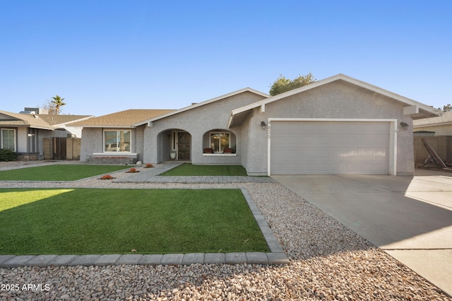 ranch-style home with a garage and a front yard