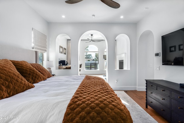 bedroom featuring ceiling fan and light hardwood / wood-style flooring