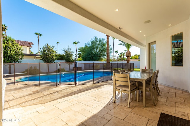 view of swimming pool featuring a patio